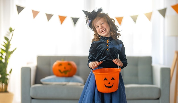 Child with carving pumpkin