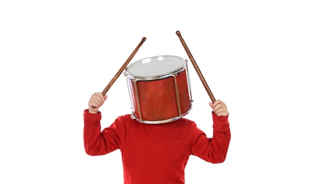 Photo child with a drum on the head