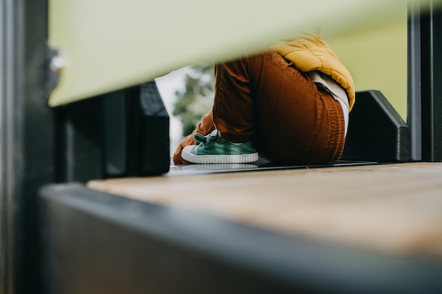 Child with green sneakers