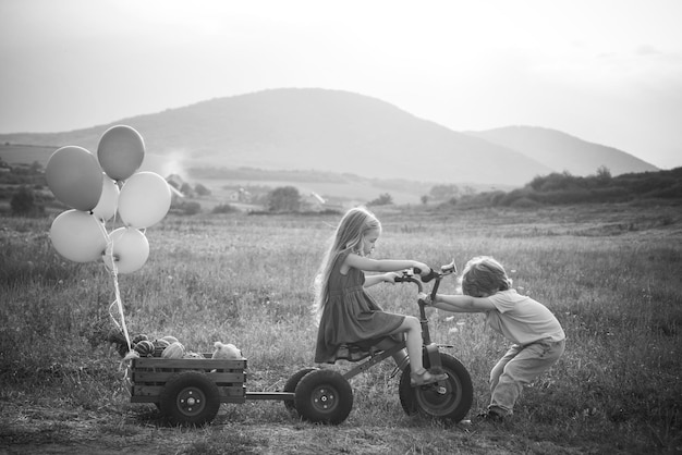 Photo childhood concept american farm life springtime on the ranch two young farmers childhood on countrys