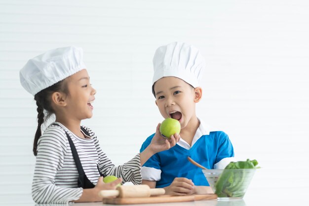 Children are enjoying cooking lessons