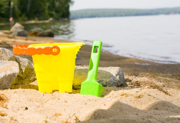 Children beach toys in the sand on a beach