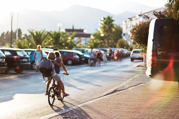 Children on bikes traveling around the city