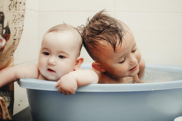 children brother and sister in the bathroom