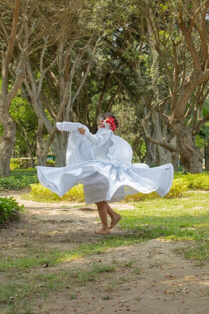 Children dancing marinera peruvian dance