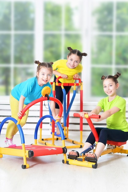 Children engaged in physical training at home