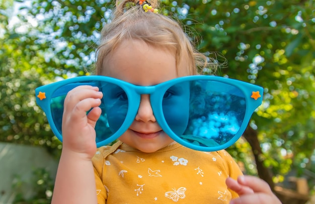 Children enjoy nature in glasses Selective focus