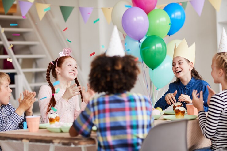 Photo children enjoying birthday dinner