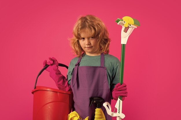 Children helping with housekeeping cleaning the house housekeeping at home cute child boy helping