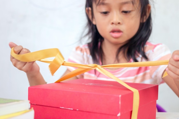 Children and homemade gifts to surprise mom