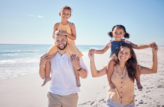 Children mother and father walking at beach during travel holiday by the ocean in Spain in summer Portrait of girl kids happy on a walk by the water in nature with parents on vacation for family