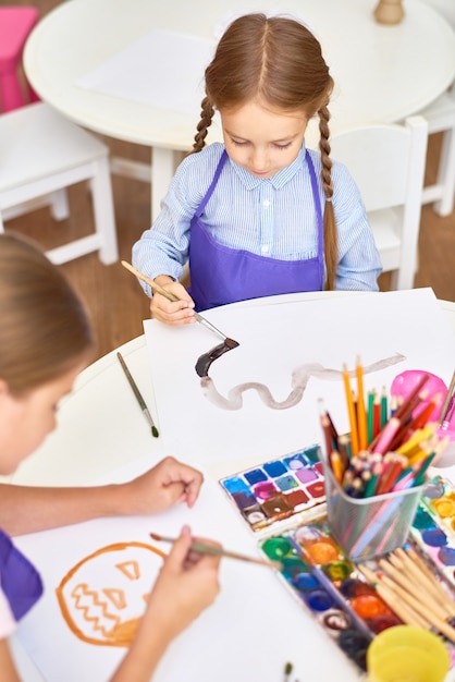 Children Painting in Art Class