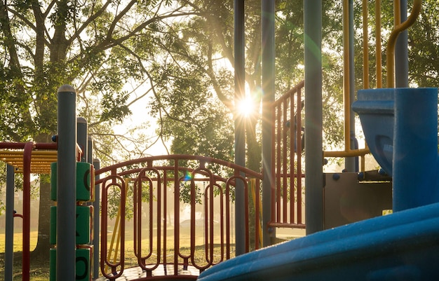 Children playground with sun rays