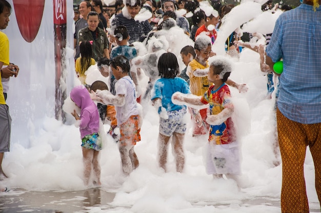 children playing foam at songkran festival in bangkok