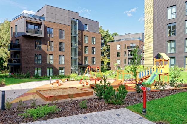 Children playing ground at architectural complex of residential buildings. And outdoor facilities.