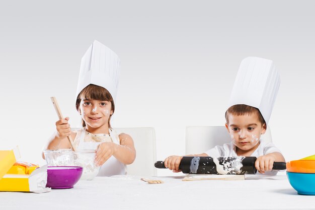 Children playing in the kitchen