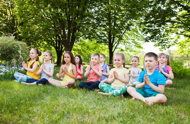 Children practicing yoga.