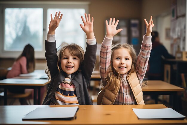 children raising hands while sitting