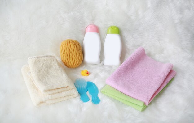 Children's bath products and hygiene items on white