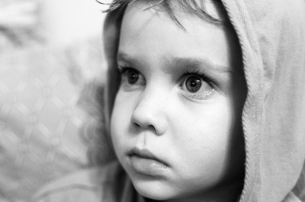 Children's candid emotions on the face. portrait of a boy with an expression of intense surprise