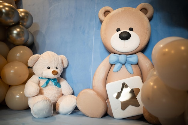 A children's corner of the photo zone with toy bears and balls