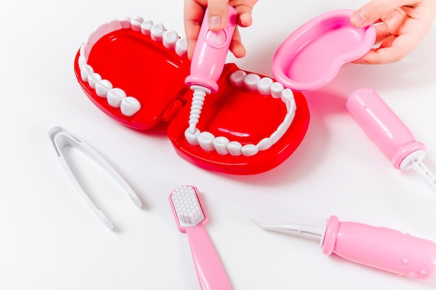 Children's dentist set White background Medical stomatology kids toys concept