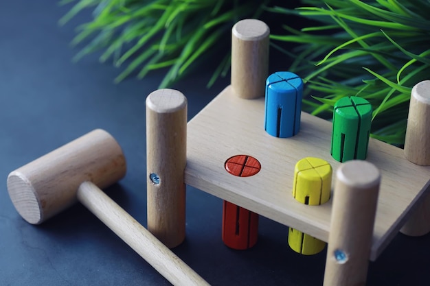 Children's development Children's wooden toy on the table in the play area Room of children's creativity and selfdevelopment Wooden constructor