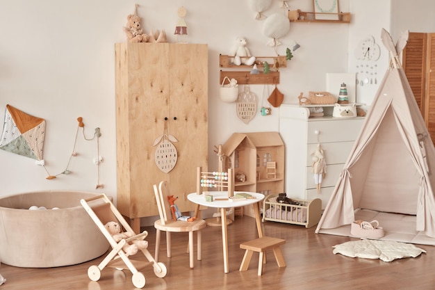 Children's educational wooden toys Nursery decor Scandinavian style playroom Wooden stroller table and chair