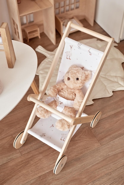 Children's educational wooden toys Nursery decor Scandinavian style playroom Wooden stroller