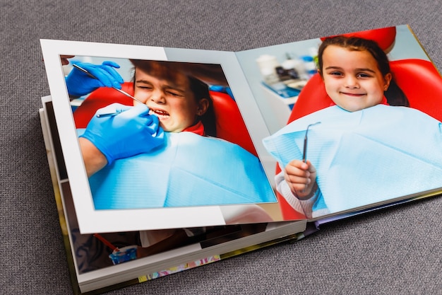 Children's photo book, a little girl at the dentist