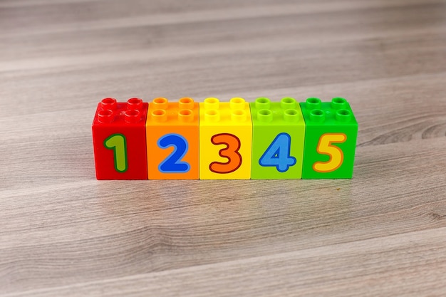 Children's plastic cubes for learning numeracy with numbers.