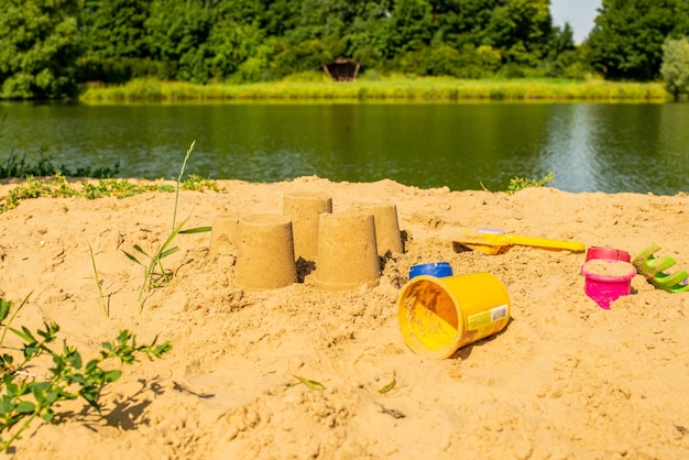 Children's pyramids made of sand, sand cakes, sand molds