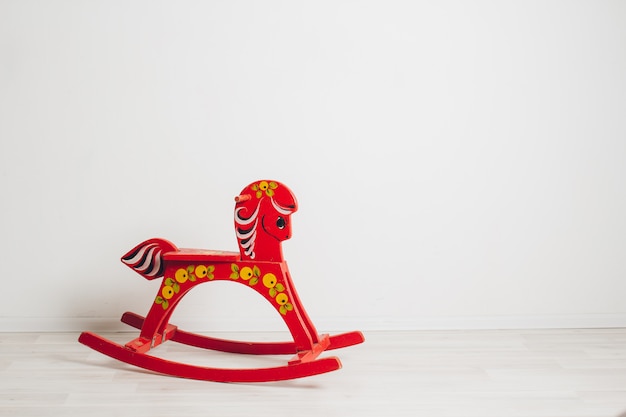 Children's rocking horse on a white background