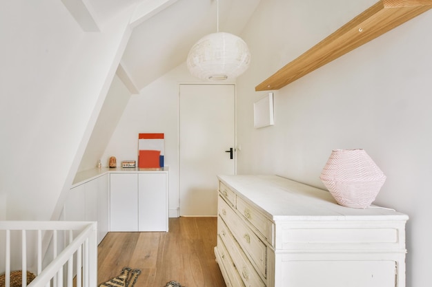 Children's room with white walls and storage space