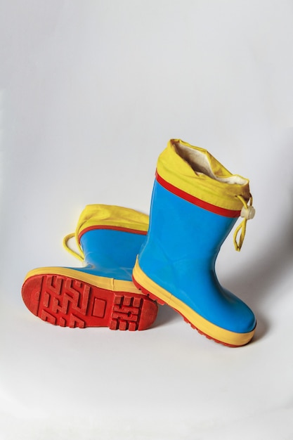 Children's rubber boots on a white background
