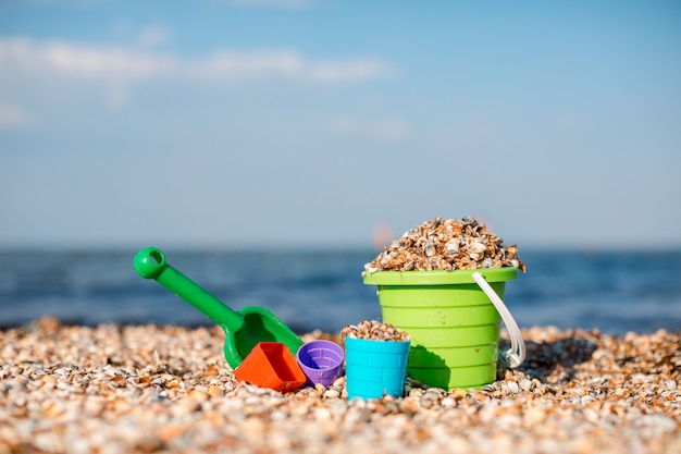 Children's set for game with sand on the seashore