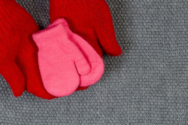 Children's small mittens in women's red mittens