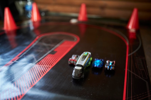 Children's toy cars on the control panel racing on toy
cars