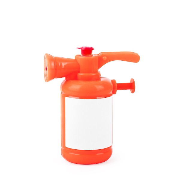 Photo children's toy fire extinguisher on a white background