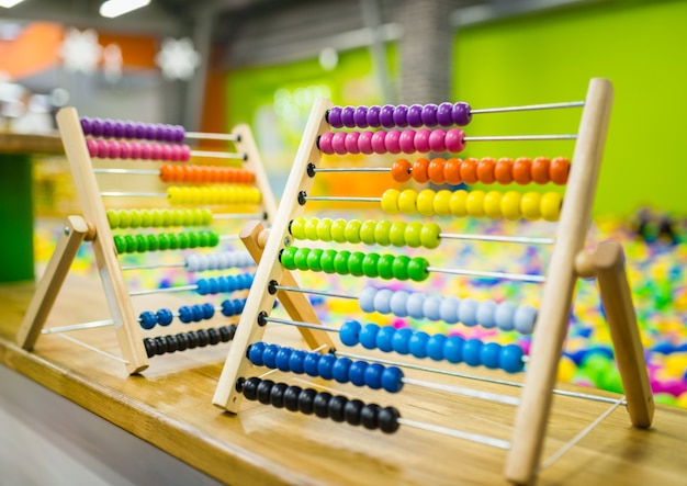 Children's wood abacus toy of bright color. Eco-friendly toys