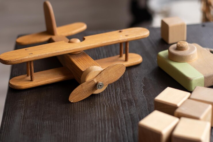 children's wooden toys cubes airplane and camera made of natural wood for children