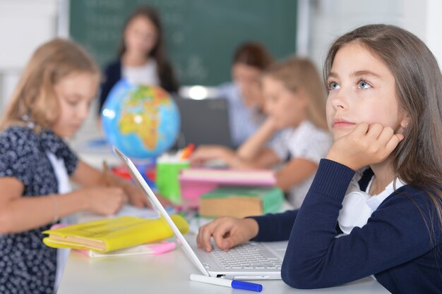 Children at school sit in the classroom