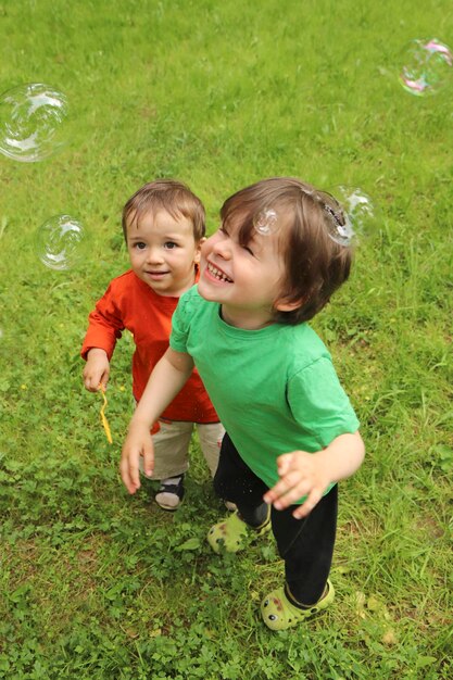 Children and soap bubbles