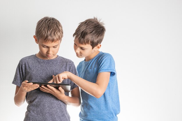 Children using digital tablet pc computer