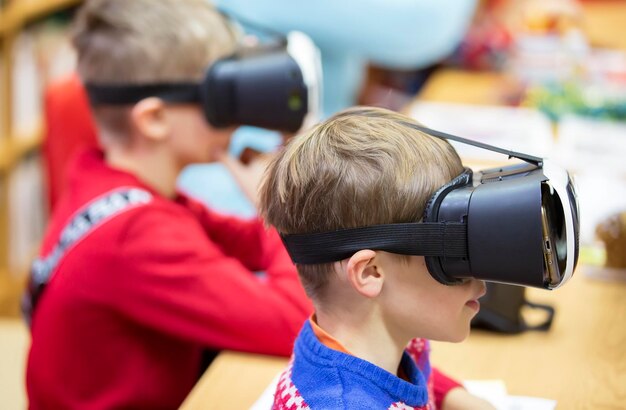 Children in virtual glasses The boy in 3D glasses