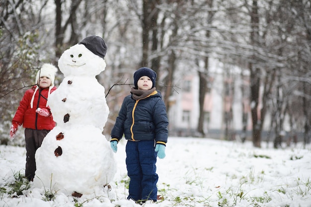 Children in winter park play