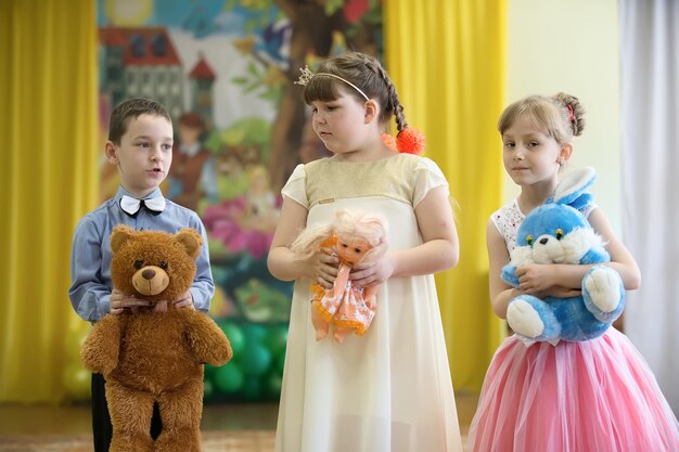 Children with soft toys