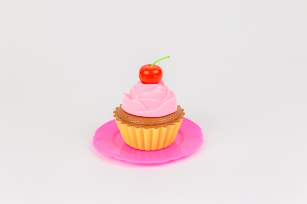 Children39s toy cupcake on a white background