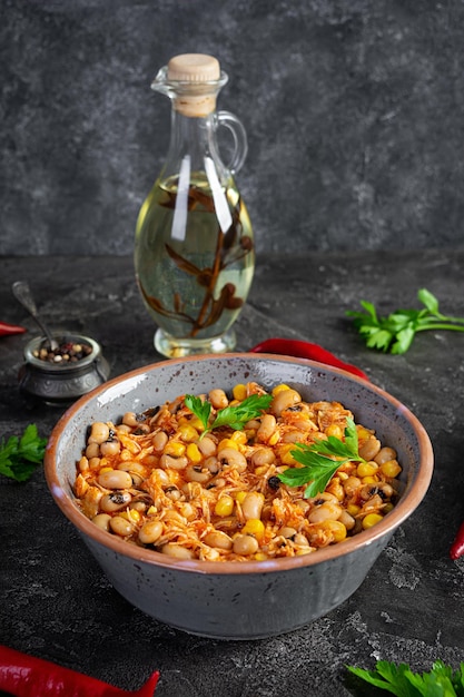 Chili con carne in a bowl Mexican cuisine Chili with meat corn and beans