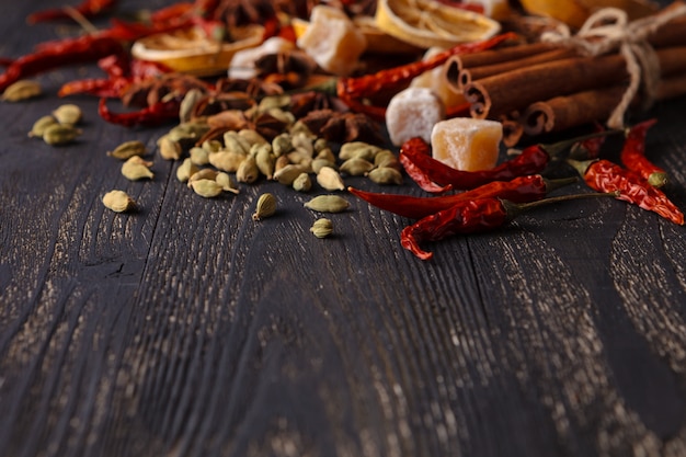 Chili peppers with wooden background